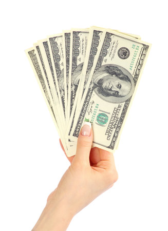 Hand with money isolated on white backgroundの写真素材