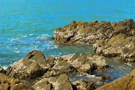 Blue ocean water and rocks