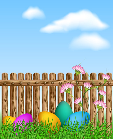 Easter eggs lying in the grass in front of a wooden fenceのイラスト素材