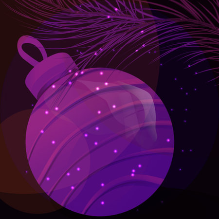 A festive mysterious atmosphere with a New Year's ball, Christmas tree branches and bokeh.の写真素材