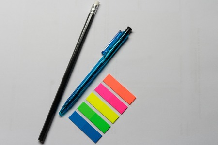 office supplies - pen, pencil and stickersの写真素材