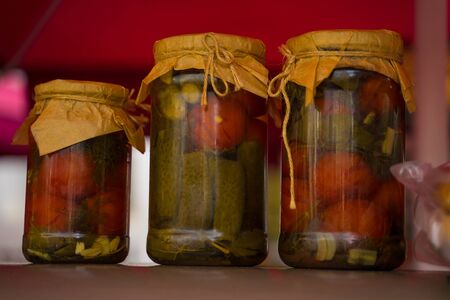 jar with pickles - cucumbers and tomatoesの写真素材