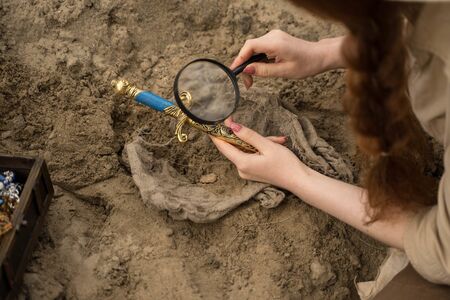 archaeologist excavates and searches for treasure using special itemsの写真素材