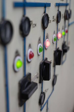 various devices with various buttons on a gray backgroundの写真素材