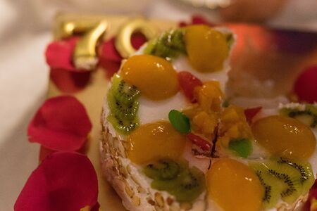 cake with different fruits and white creamの写真素材