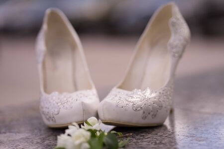 white high-heeled women shoes with patterns