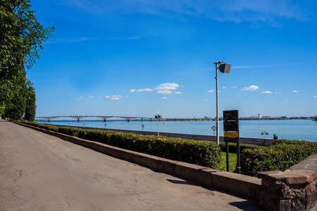 embankment overlooking the bridge and against the blue skyの写真素材