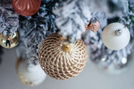 christmas toys on an artificial tree
