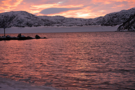 arctic ocean at sunset in winterの写真素材