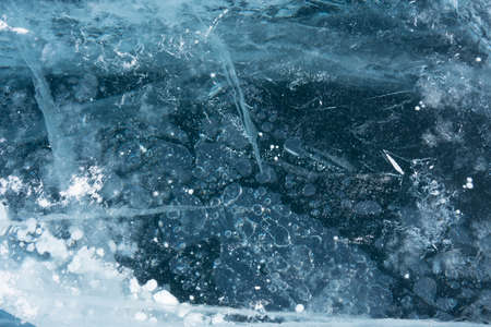 patterns in a frozen and transparent lakeの写真素材