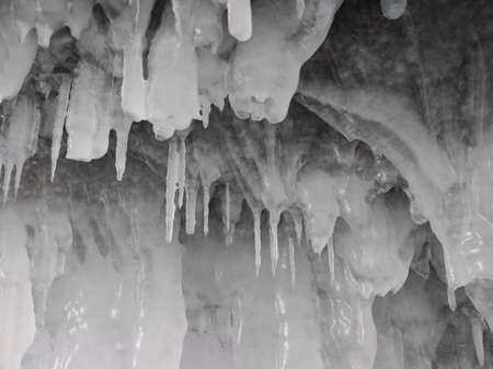 ice cave with long icicles and overlapsの写真素材