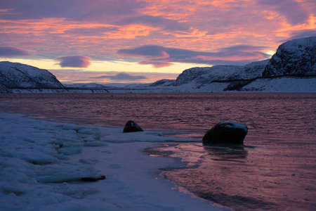 arctic ocean with ice and at sunsetの写真素材