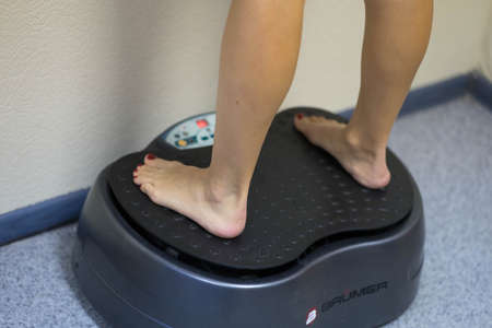 the girl stands on the platform for weight loss