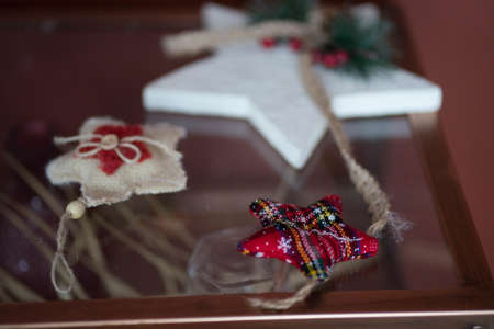 New Years stars of white-red color lie on a table