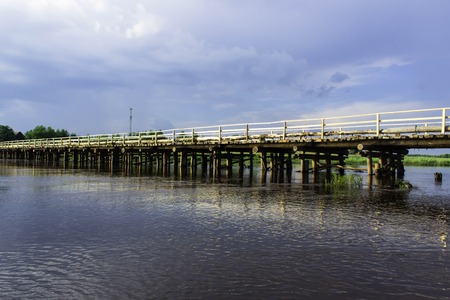 View of the Vyatka river with a wooden bridgeの写真素材