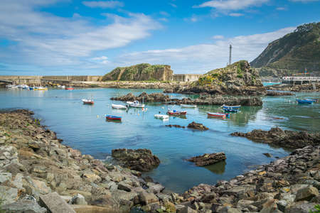 A view of the small fishing boats in the harbour on the Isle of Skye, Scotlandの写真素材