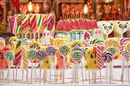 colorful and tasty lollipops in different shapesの写真素材