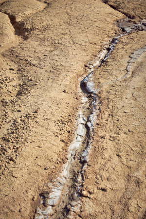 cones of mud volcanoes from which rivers of mud flow