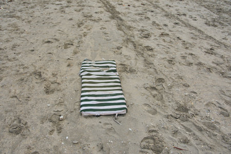 abandoned waste on the sea beachの写真素材