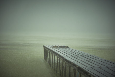 fishing pontoon in the rainの写真素材