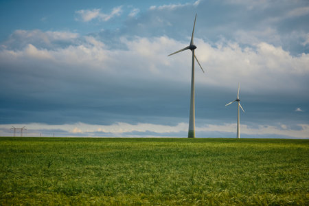 wind farms in Dobrogea in the warm sunlightの写真素材