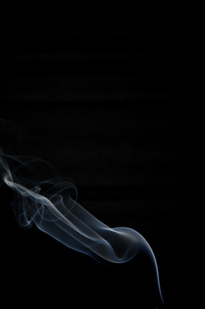 Cloud of smoke, looking as woman figureの写真素材