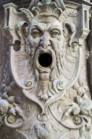Architectural detail representing a devilish mythological characterの写真素材