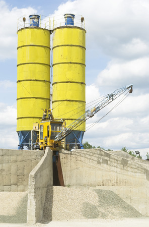  Gravel processing machinery with two yellow reservoirs at a small quarryの写真素材