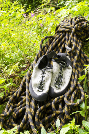 Rock climber s essential gear, dynamic rope and climbing shoesの写真素材