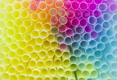 Colored drinking straw tubes, close-up backgroundの写真素材