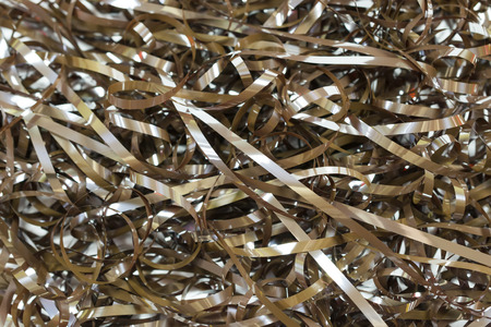 Magnetic tape from a compact audio cassette tangled, backgroundの写真素材