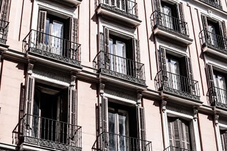 Mediterranean architecture in Spain. Old apartment building in Madrid.  ( HDR image )の写真素材