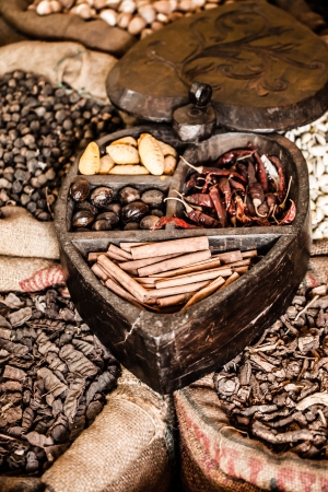 Spices and herbs in bags at market in India ( HDR image )の写真素材