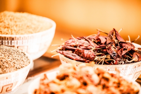 Spices and herbs in bowls. Food and cuisine ingredients. Colorful natural additives. ( HDR image )の写真素材