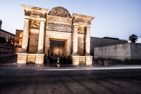 Bridge Gate (Spanish: Puerta del Puente) triumphal Renaissance arch illuminated at night in Cordoba, Andalusia, Spain. のeditorial素材