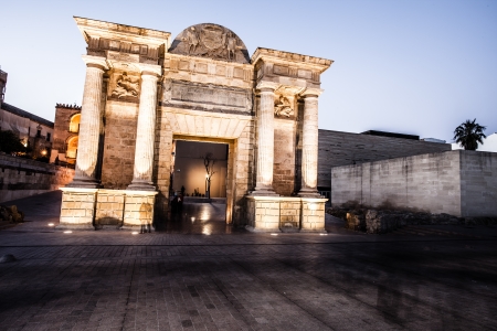 Bridge Gate (Spanish: Puerta del Puente) triumphal Renaissance arch illuminated at night in Cordoba, Andalusia, Spain. のeditorial素材