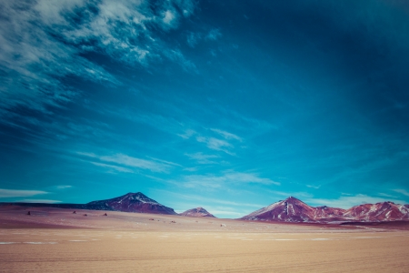 Desert and mountain over blue sky and white clouds on Altiplano,Bolivia の写真素材