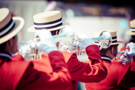 Brass Band in red uniform performingのeditorial素材