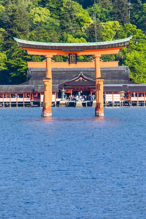 Miyajima, Famous big Shinto torii standing in the ocean in Hiroshima, Japan のeditorial素材
