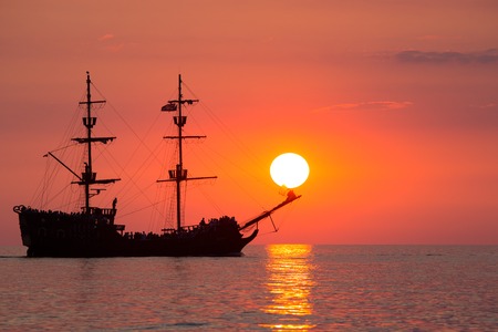 Boat on the sea at sunset in Baltic Sea, Poland.の写真素材