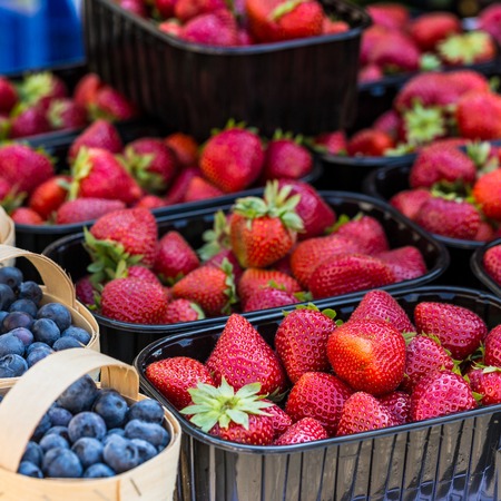 Baskets Of Fresh Strawberries In A Street Market の写真素材