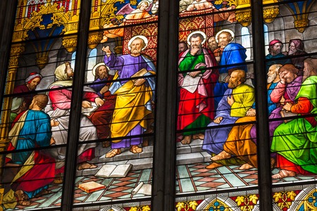 COLOGNE, GERMANY - AUGUST 26: Stained glass church window with Pentecost theme in the cathedral on August 26, 2014 in Cologneのeditorial素材
