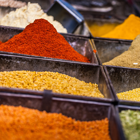 Traditional spices and dry fruits in local bazaar in India.の写真素材