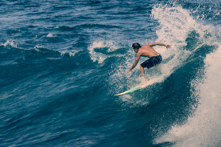 Extreme surfer riding giant ocean wave in Hawaiiのeditorial素材