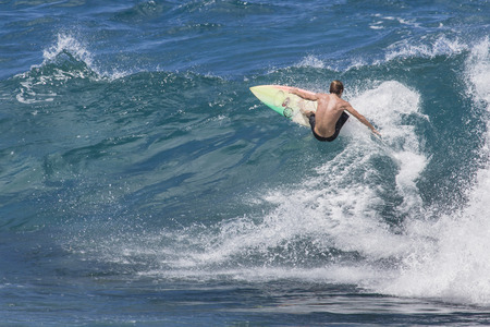 Extreme surfer riding giant ocean wave in Hawaiiのeditorial素材