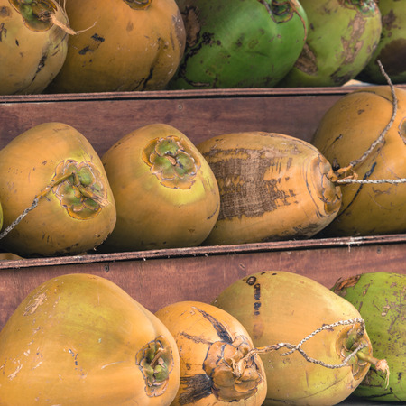 Bright colorful coconut stand on town street