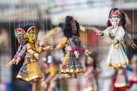 Masks, dolls and souvenirs in street shop at Durbar Square in Kathmandu, Nepal.の写真素材
