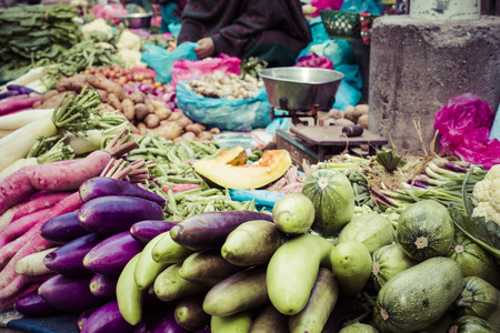 The street vendor sels his fruits and vegetables in Thamel in Kathmandu, Nepal.