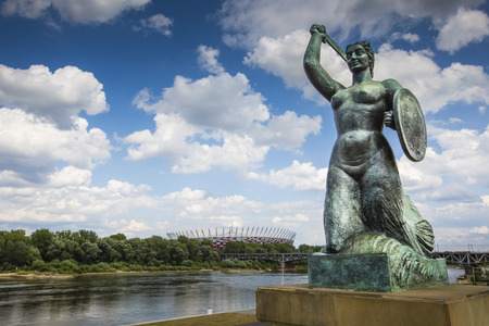 The Warsaw Mermaid called Syrenka on the Vistula River bank in Warsaw, Polandの写真素材