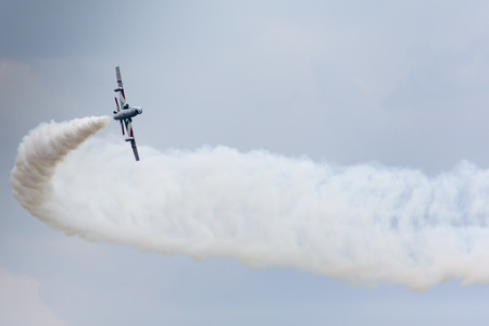 RADOM, POLAND - AUGUST 23: Aerobatic group formation "Frecce Tricolori" italian aerobatic Team at blue sky during Air Show Radom 2015 event on August 23, 2015 in Radom, Polandのeditorial素材